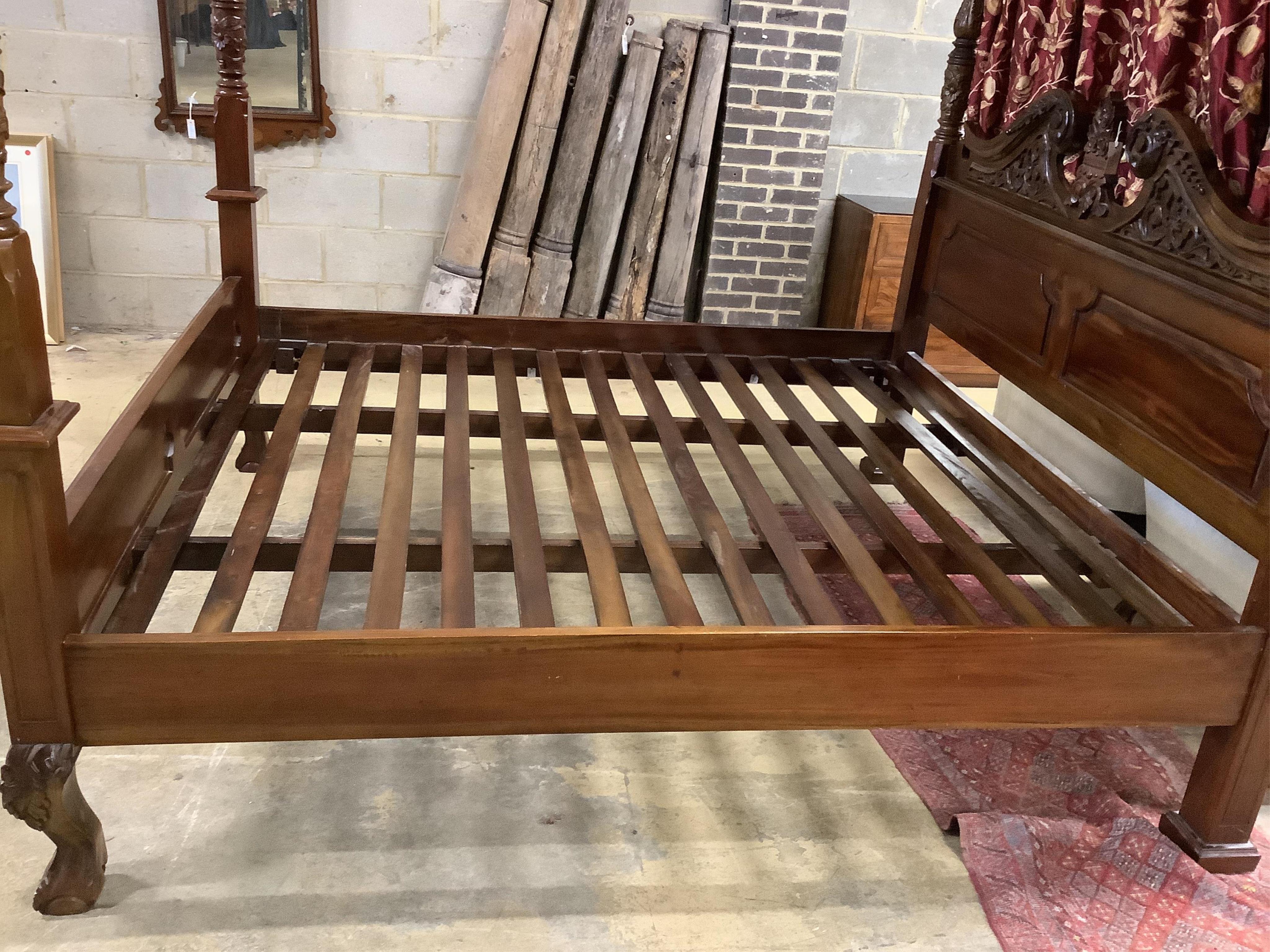 A large George III style mahogany four poster bedframe, width 192cm, length 214cm, height 236cm. Condition - good